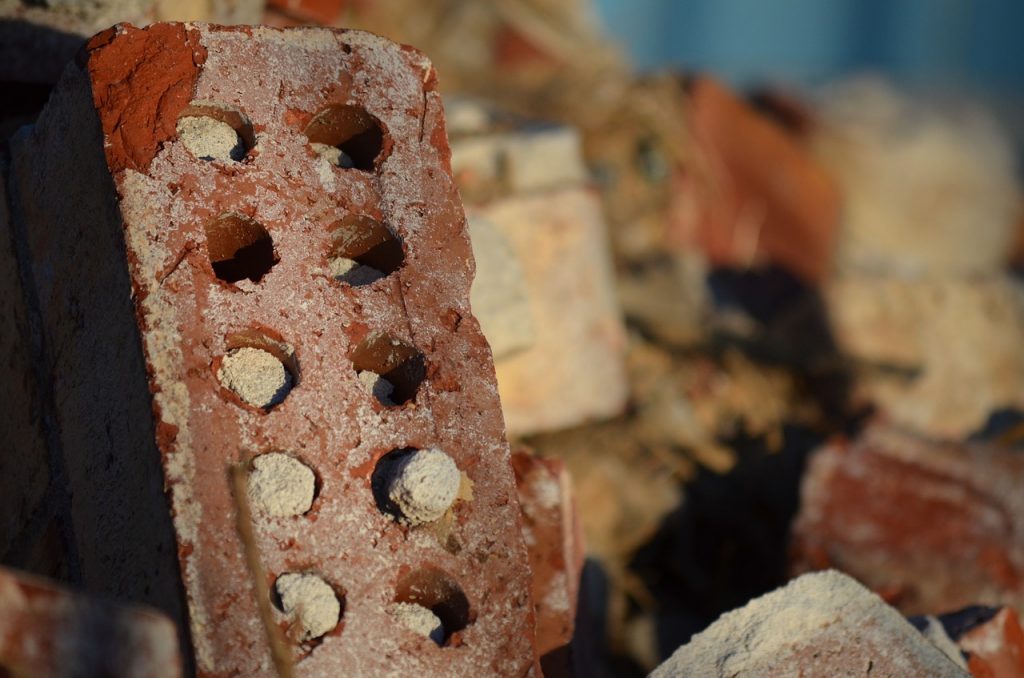 A photo of brick and mortar at a jobsite, illustrating how Mint Transactions constitute the bricks in your financial foundation.