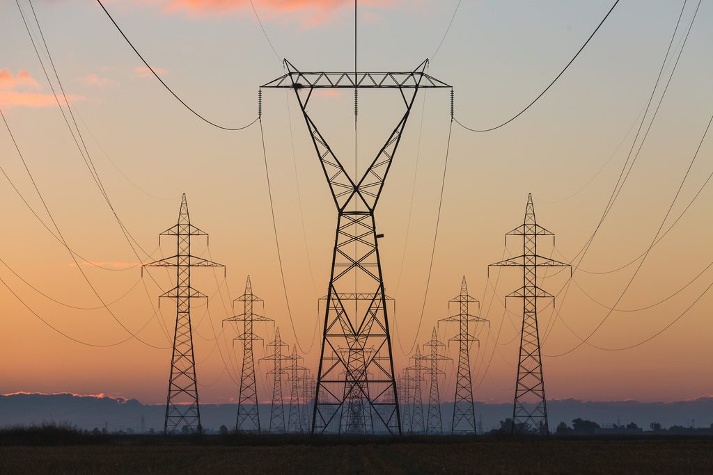 Power lines trailing into the distance, illustrating the power of delayed gratification.