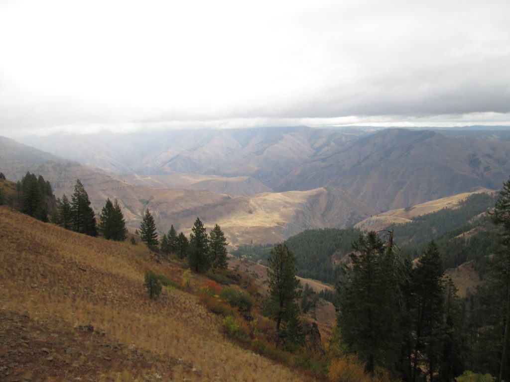 Sheets of rain sweeping across the Idaho Sun Devils range bordering Hells Canyon.